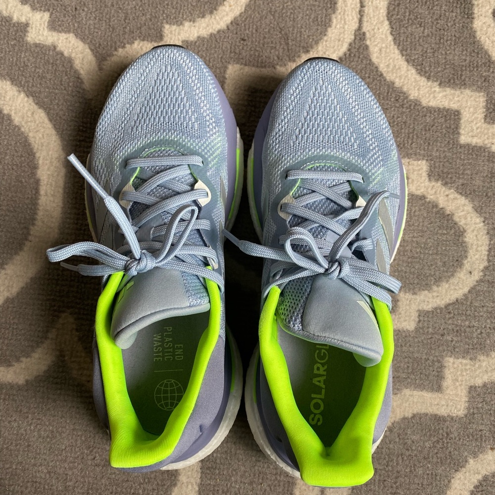 New Solar Glide Running Shoes with Neon Accents